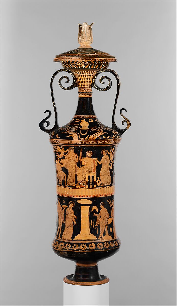 A terracotta vase illustrated with rows of figures telling the story of adonis. It has a elaborate handle. 